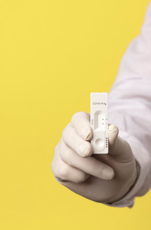 COVID-19 virus disease test in doctor hands, coronavirus crisis test, global pandemic outbreak,...