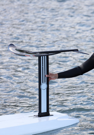 foilboard in the water, hydrofoil keel detailの写真素材