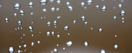 Water drops on the brown background,の写真素材
