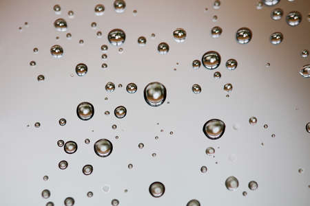 Water drops on the brown background,の写真素材