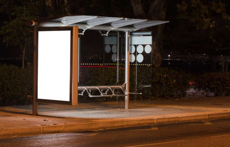 Billboard with light in the center of the city at nightの写真素材