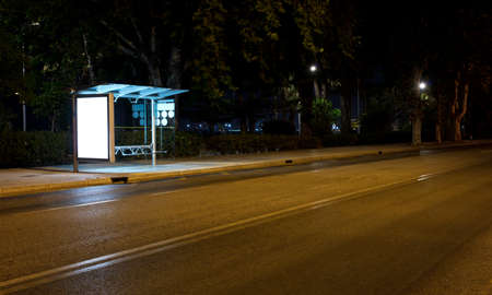 Billboard with light in the center of the city at nightの写真素材