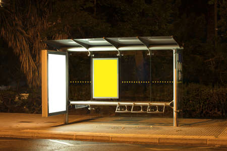 Billboard with light in the center of the city at nightの写真素材