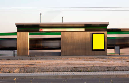 Billboards at the subway station at sunsetの写真素材