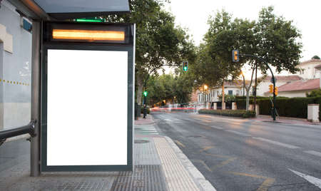 billboard at taxi rank, at sunset in the cityの写真素材