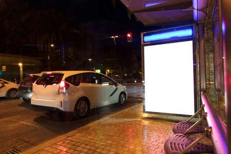 billboard at taxi rank, at night in the cityの写真素材