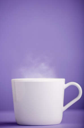 White ceramic cup of coffee or tea with hot steam, with a purple background (very peri).の写真素材