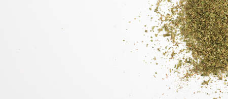 partial view of crushed marijuana, white background, space for textの写真素材