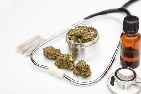 marijuana buds, joint, grinder, bottlel oil, phonendoscope, with white background.の写真素材
