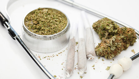 marijuana buds, joint, phonendoscope, with white background.の写真素材