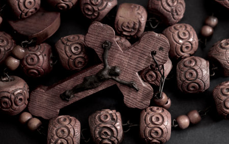 wooden catholic rosary on gray backgroundの写真素材