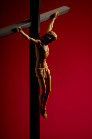 christian crucifix and red backgroundの写真素材