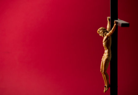 christian crucifix and red backgroundの写真素材
