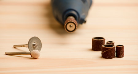 cutting disc and grinders with dremel machine, on work tableの写真素材