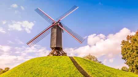 Old wooden windmill in Bruges, Belgium.の写真素材