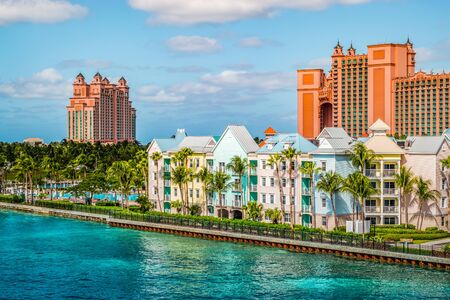Colorful houses along the waterfront at the ferry terminal of Paradise Island, Nassau, Bahamas.の写真素材