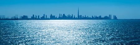 Dubai skyline at night panorama banner.の写真素材