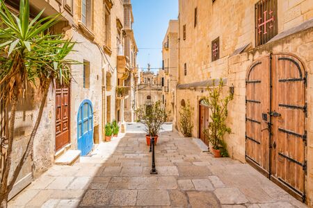 Narrow street in city center of Valletta, Malta.の写真素材
