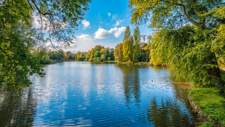 Beautiful landscape with lake in Rivierenhof park, Antwerp, Belgium.の写真素材