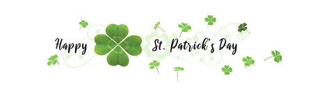 Happy St. Patrick's Day illustration banner with clover leaves isolated on white background.の写真素材