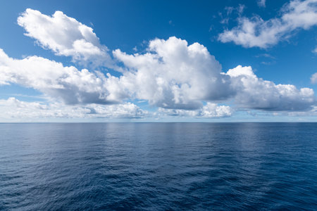 Beautiful seascape with clouds and blue sky over the sea.の写真素材