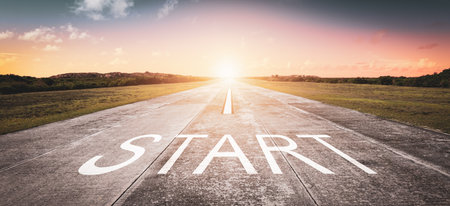 Start word written on the road. The beginning of something new. Business and getting ahead concept.の写真素材