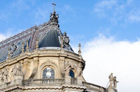 Building with cross on top of the roof within the Palace of Versaillesの写真素材