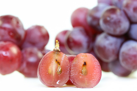 Red grape isolated on white.の写真素材