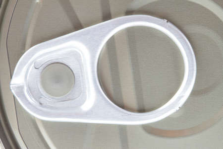 Top view of a can with key isolated on white backgroundの写真素材