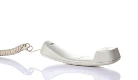 White telephone handsets. Isolated on a white background.の写真素材