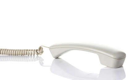White telephone handsets. Isolated on a white background.の写真素材