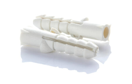 plastic dowels on white backgroundの写真素材