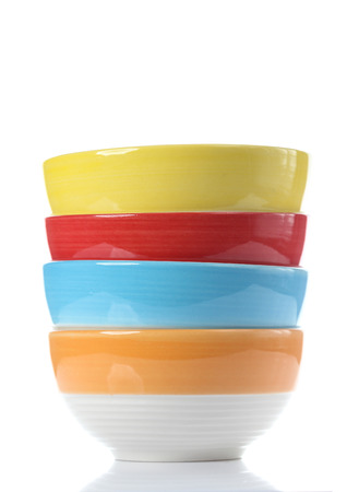 bright empty bowls isolate on whiteの写真素材