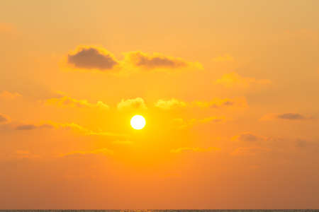 sun light through clouds in sun rise or sunset