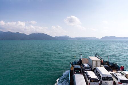 TRAT, THAILAND  April 2 : Cars loaded on ferry boat and heading to Koh Chang island on April 2, 2015 in Koh Chang, Trat, Thailand.のeditorial素材