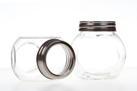 Glass jar isolate on whiteの写真素材