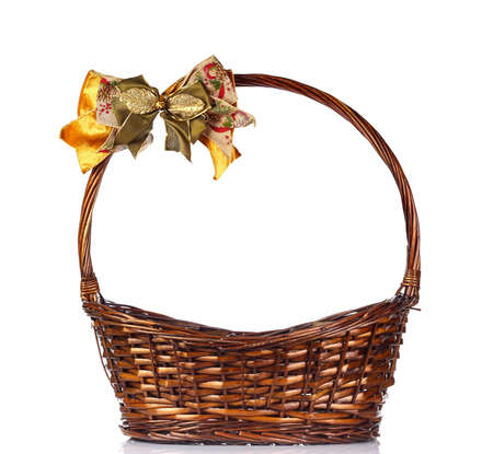 Empty wicker basket isolated on whiteの写真素材