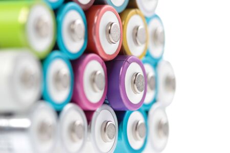 Several AA batteries in perspective closeup view on white backgroundの写真素材