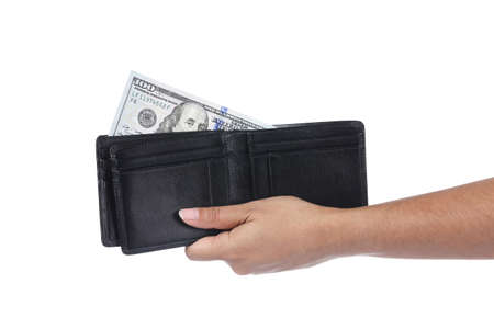 black wallet with dollars in the hands