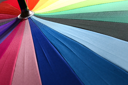 Colorful umbrella for a colorful background.の写真素材
