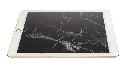 Tablet with broken screen isolate on whiteの写真素材
