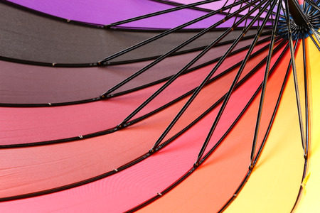 Colorful umbrella for a colorful background.の写真素材