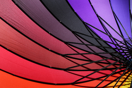 Colorful umbrella for a colorful background.の写真素材