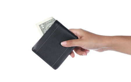 black wallet with dollars in the handsの写真素材