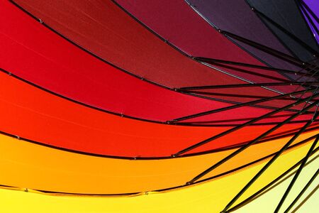 Colorful umbrella for a colorful background.の写真素材