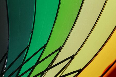 Colorful umbrella for a colorful background.の写真素材