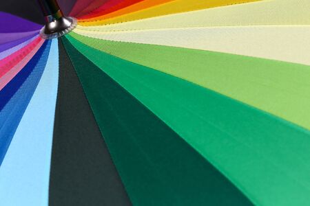 Colorful umbrella for a colorful background.の写真素材