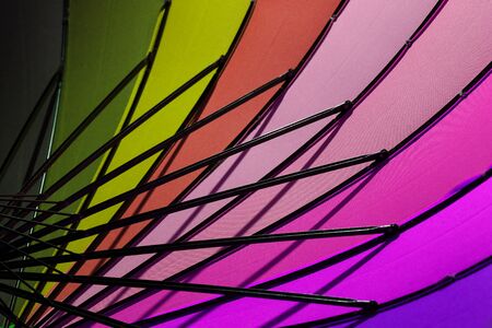Colorful umbrella for a colorful background.の写真素材
