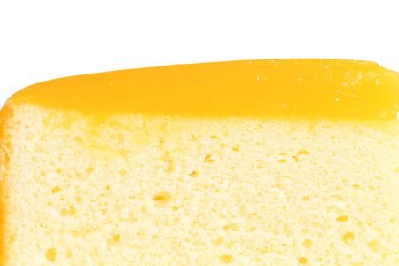 orange cake on white background.の写真素材