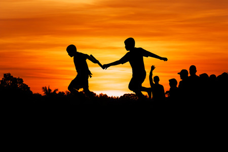little boy athletes run the stadium.の写真素材